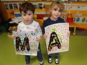 Notre initiale en bonbons (PS)